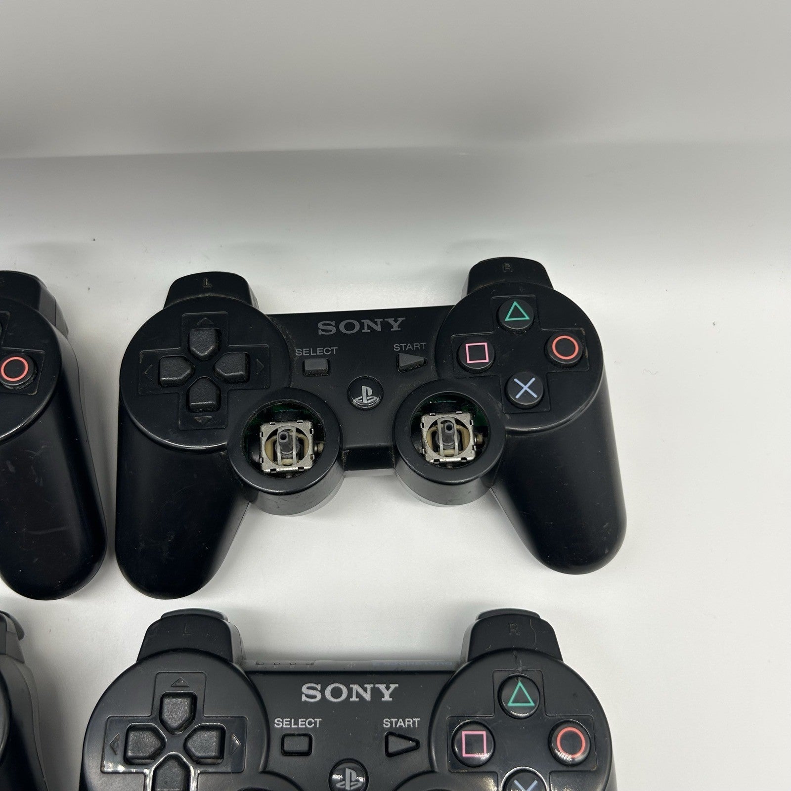 Lotto 9 Controller PS3 Sony DualShock 3 Sixaxis PER RICAMBI Non Funzionanti