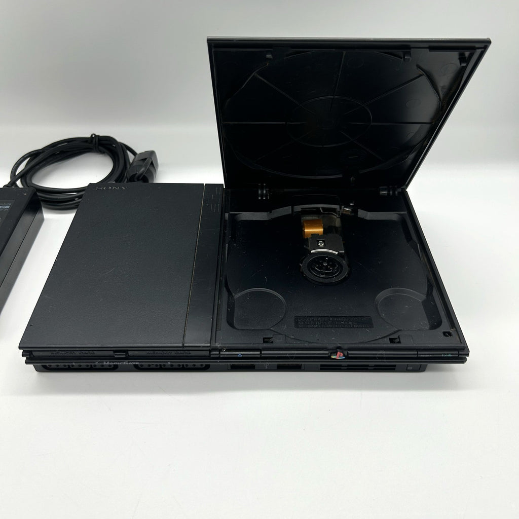PS2 Slim SCPH-70004 + alimentatore – per ricambi / riparazione
