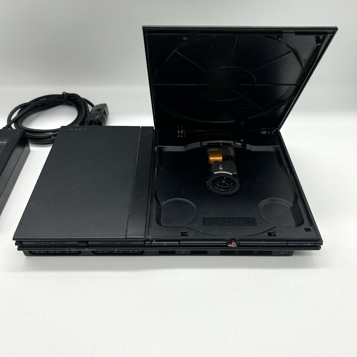 PS2 Slim SCPH-70004 + alimentatore – per ricambi / riparazione