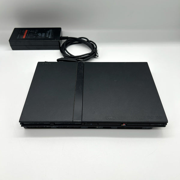 PS2 Slim SCPH-70004 + power supply – for parts / repair