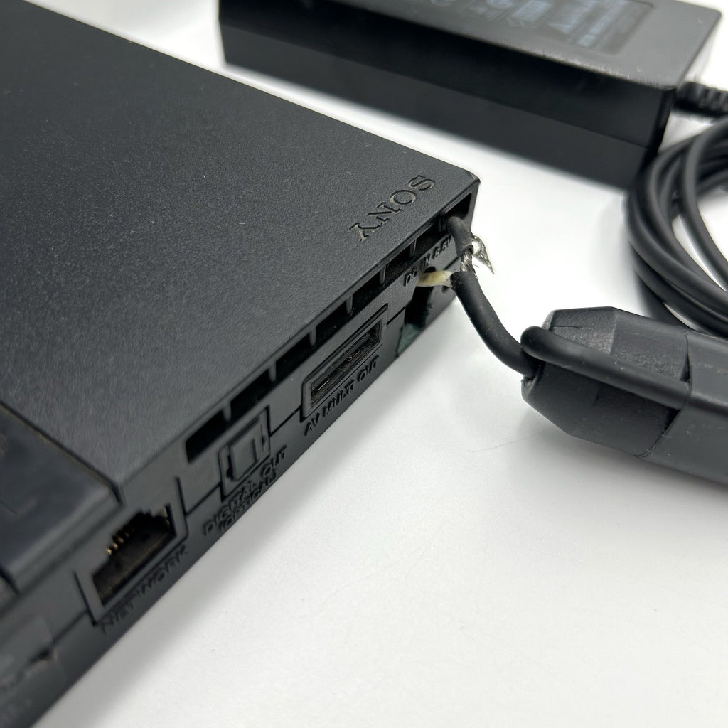 PS2 Slim SCPH-70004 + alimentatore – per ricambi / riparazione