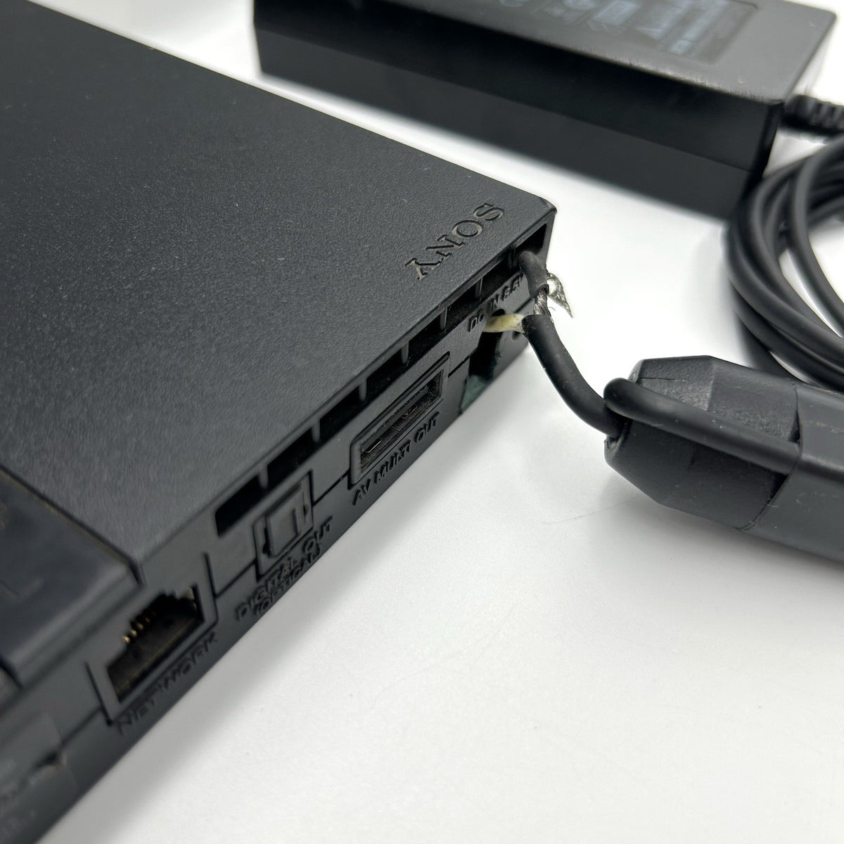 PS2 Slim SCPH-70004 + alimentatore – per ricambi / riparazione