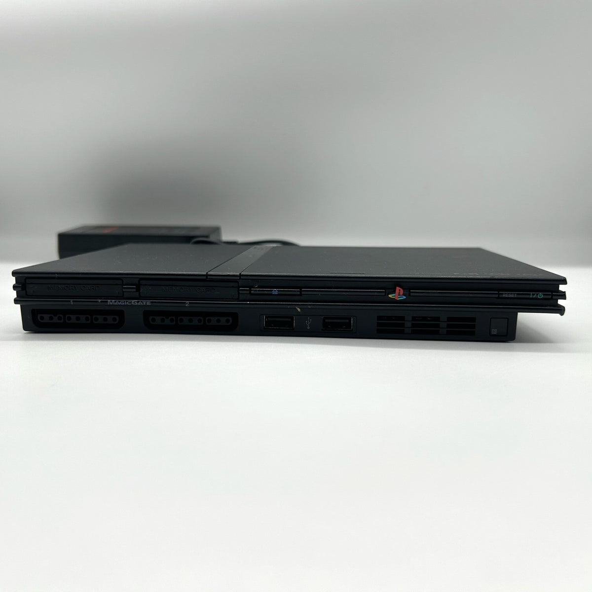 PS2 Slim SCPH-70004 + alimentatore – per ricambi / riparazione