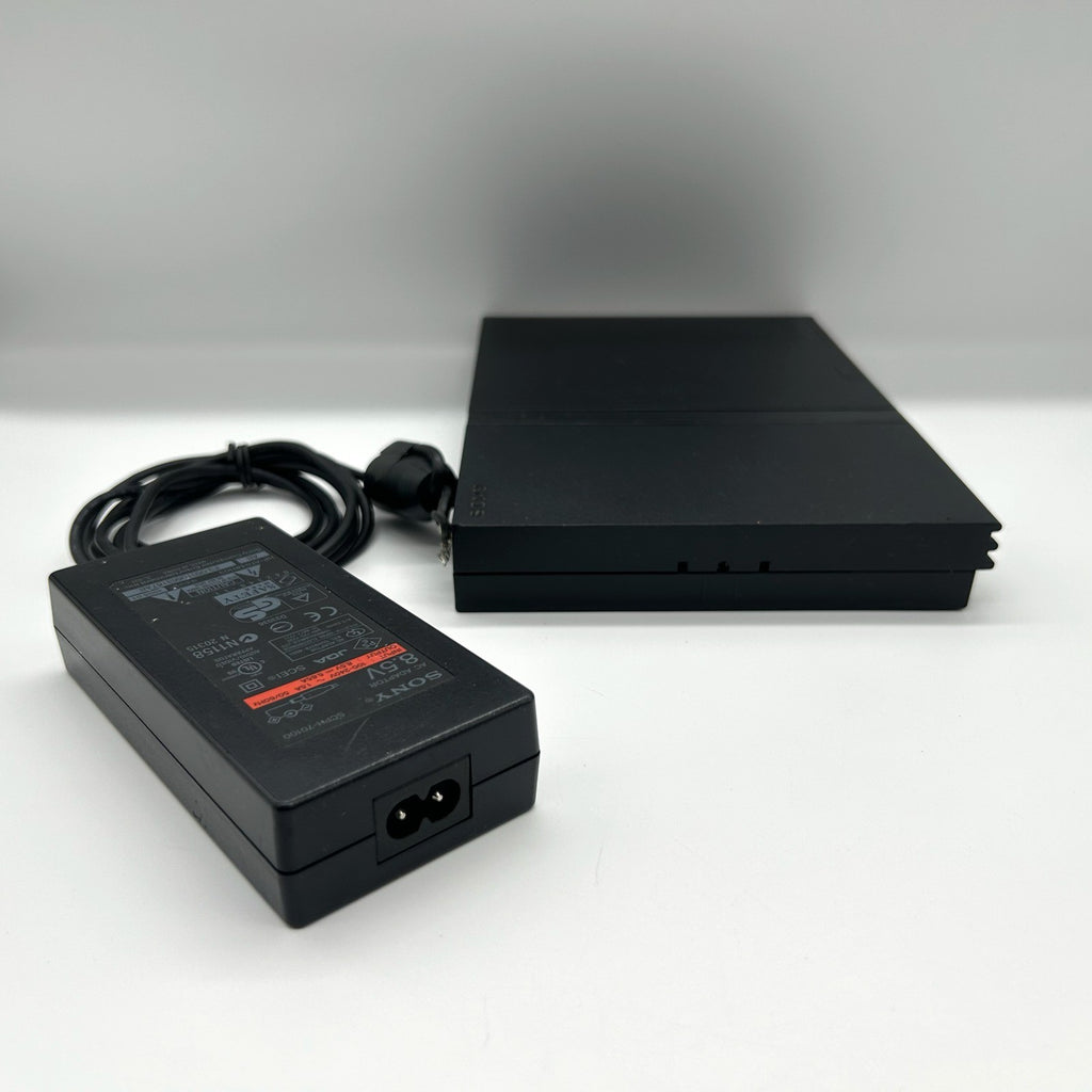 PS2 Slim SCPH-70004 + alimentatore – per ricambi / riparazione