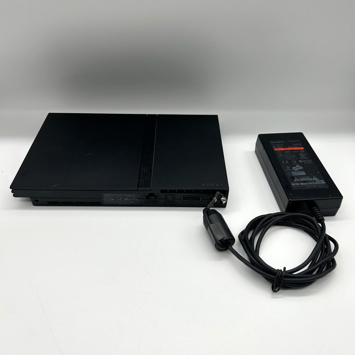PS2 Slim SCPH-70004 + alimentatore – per ricambi / riparazione